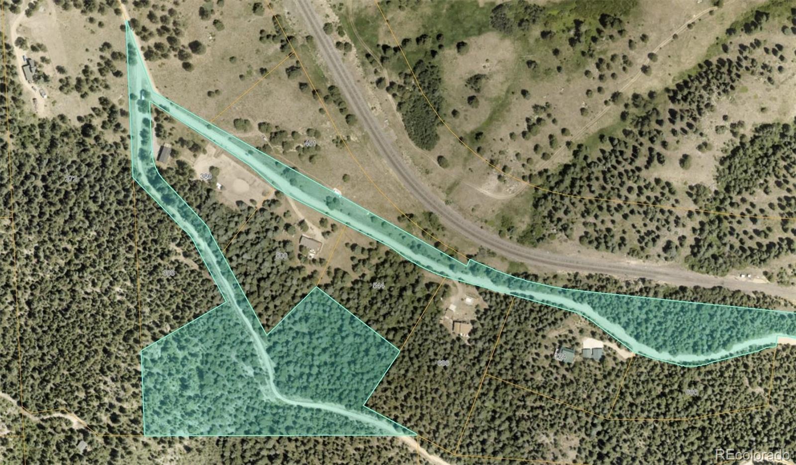 1546 Chute Road Golden, CO 80403 - Photo 36 of 36 a view of a yard with a plant