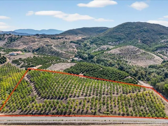 a view of a city with a lake