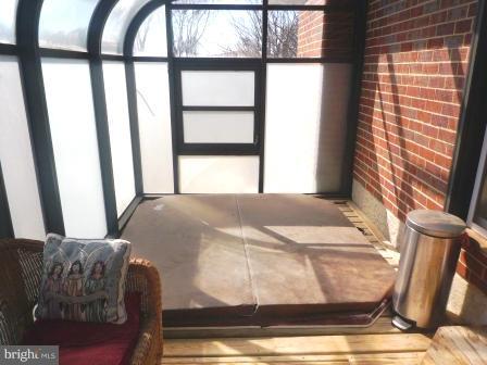 1209 Berkwood Road Baltimore, MD 21237 - Photo 8 of 19 Sunroom with hot tub