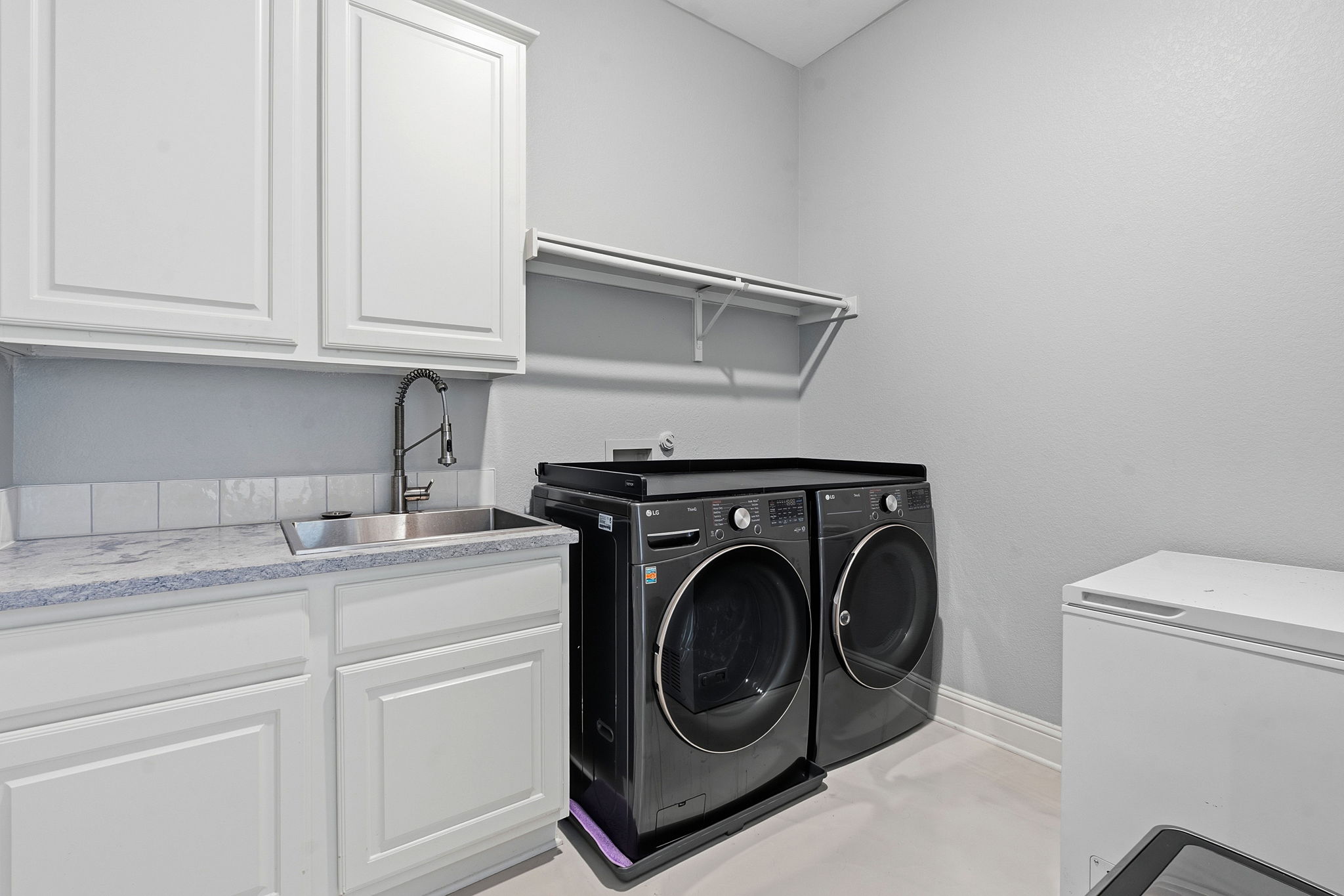 5000 Mission Oaks Boulevard, Unit 30 Austin, TX 78735 - Photo 18 of 31 Laundry room with a sink and separate washer and dryer. 5000 Mission Oaks Dr #30