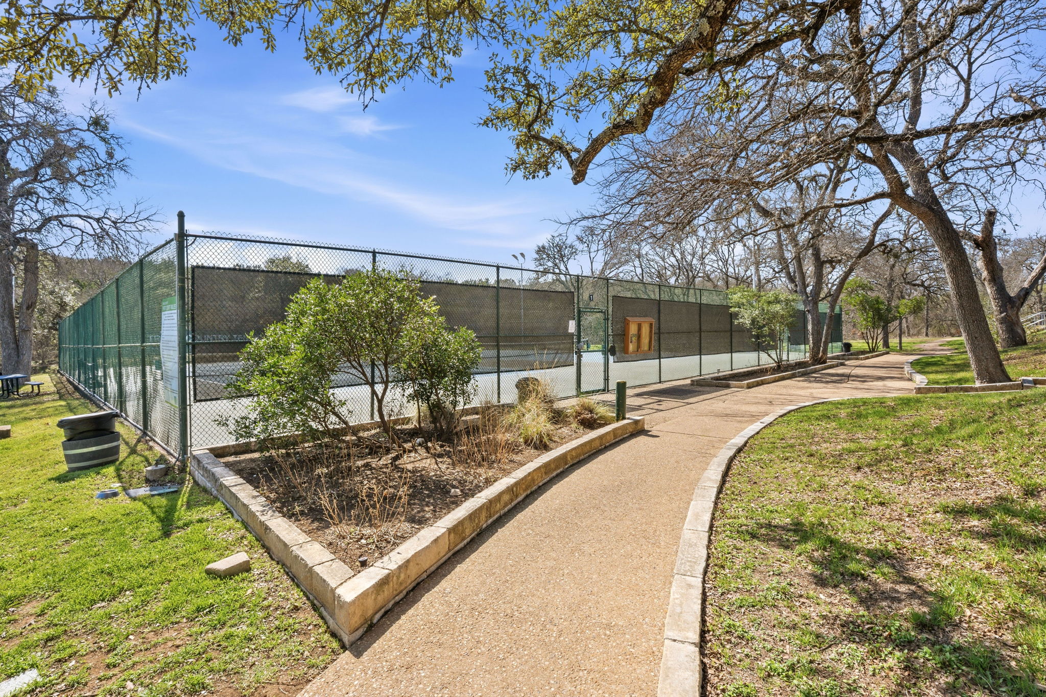 5000 Mission Oaks Boulevard, Unit 30 Austin, TX 78735 - Photo 29 of 31 Surrounding community featuring a tennis court