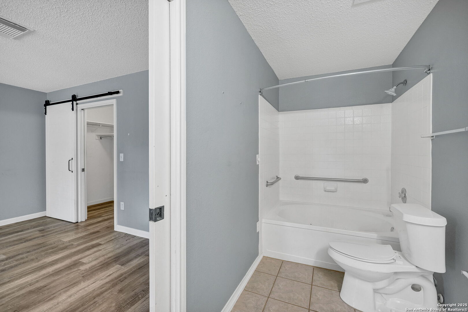 7362 Rustling Brook San Antonio, TX 78249 - Photo 21 of 36 a bathroom with a toilet and a shower