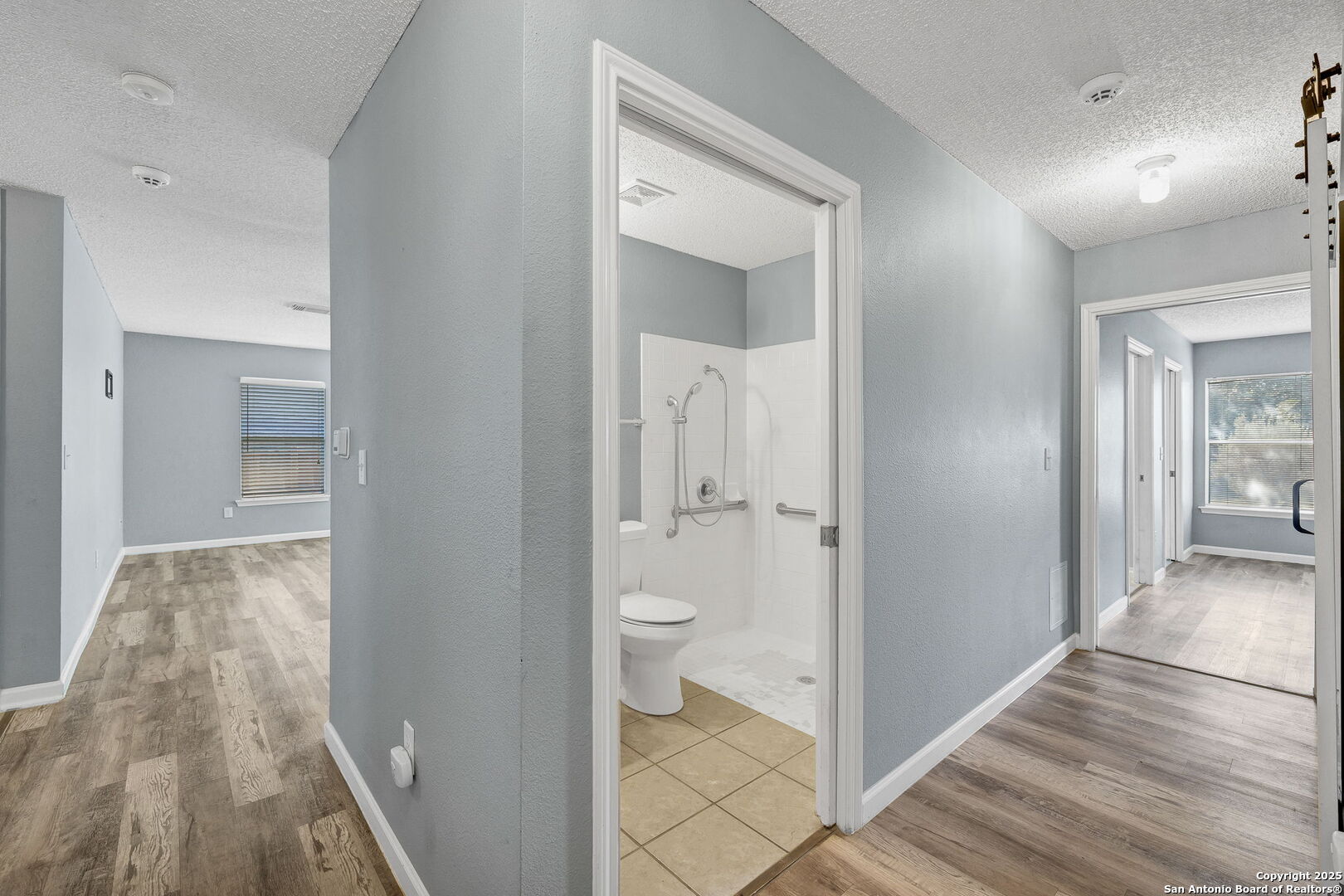 7362 Rustling Brook San Antonio, TX 78249 - Photo 24 of 36 a view of a bathroom from a hallway