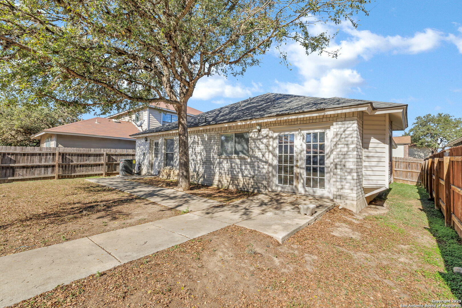 7362 Rustling Brook San Antonio, TX 78249 - Photo 33 of 36 a view of a house with backyard and sitting area