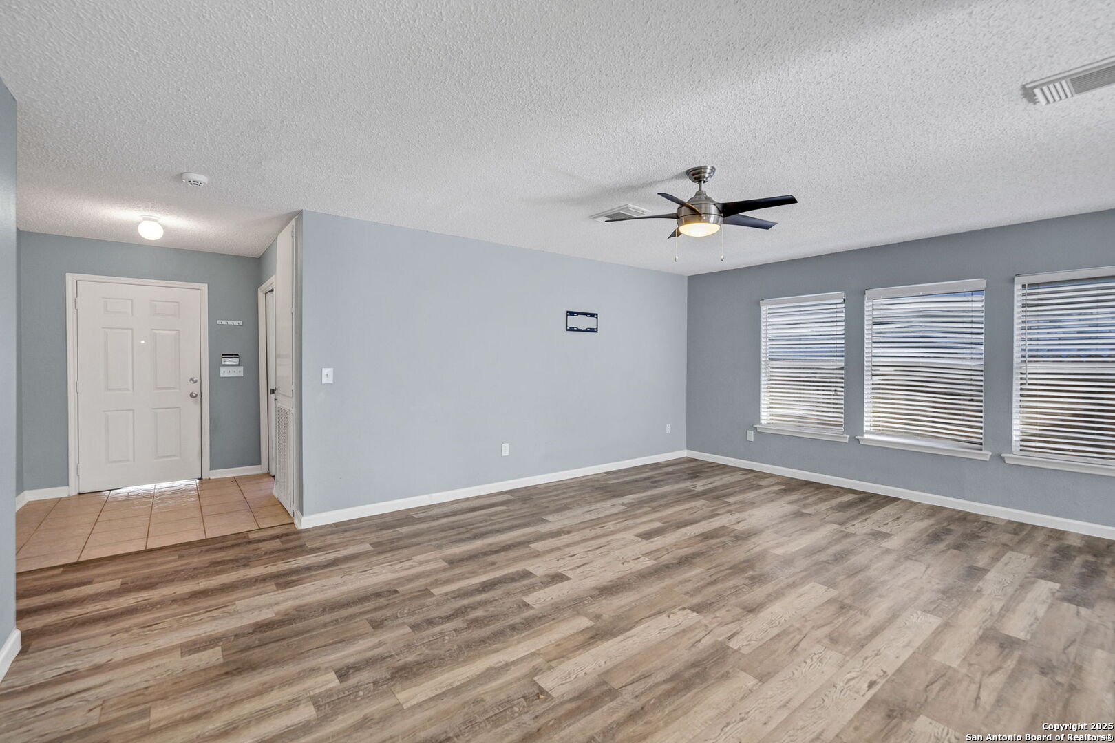 7362 Rustling Brook San Antonio, TX 78249 - Photo 9 of 36 a view of an empty room with a window