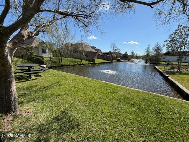 141 Treasure Cove Lafayette, LA 70508 - Photo 27 of 32 141 lake and picnic area