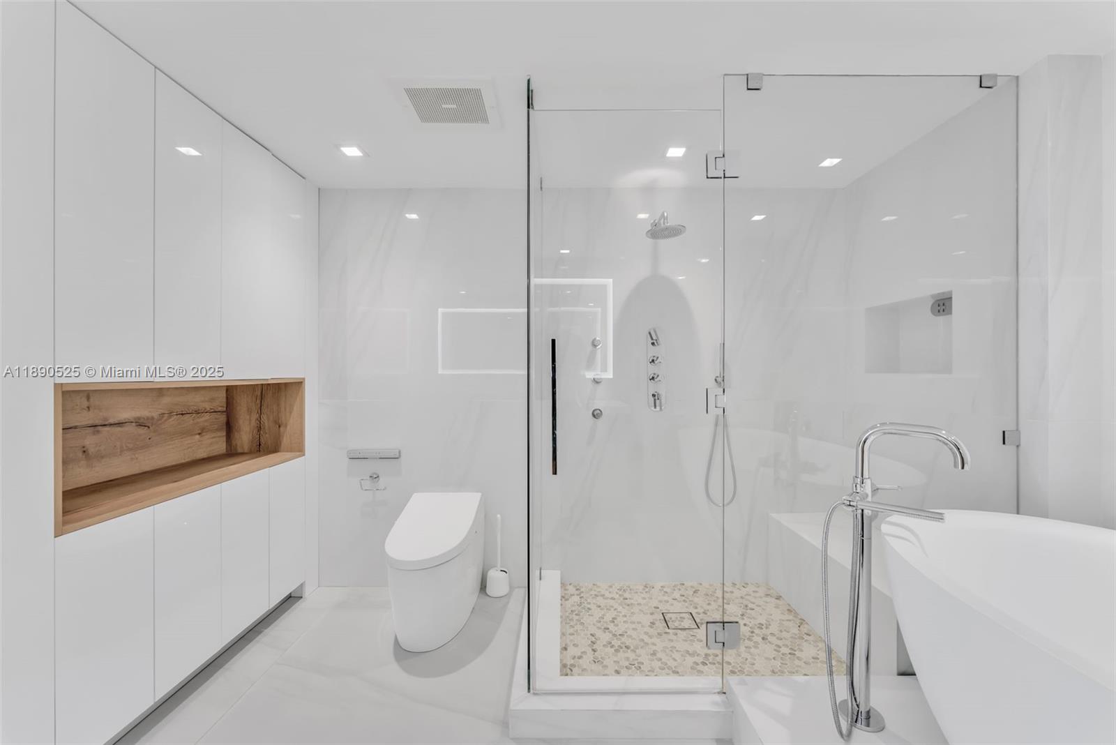 465 Brickell Avenue, Unit 4201 Miami, FL 33131 - Photo 9 of 16 a bathroom with a toilet sink and shower