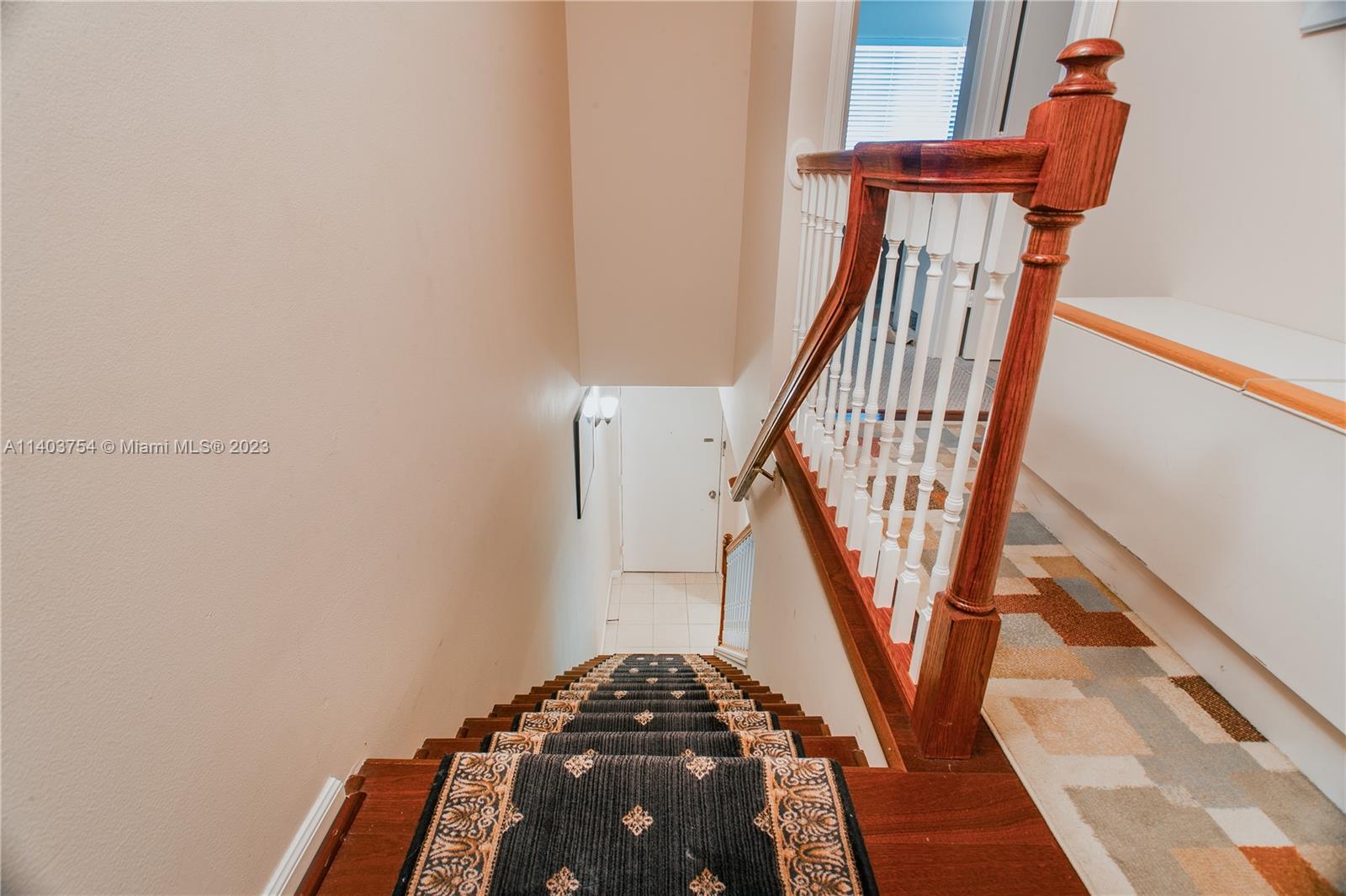 894 Southwest 9th St Circle, Unit 8 Boca Raton, FL 33486 - Photo 12 of 24 a view of entryway with wooden floor