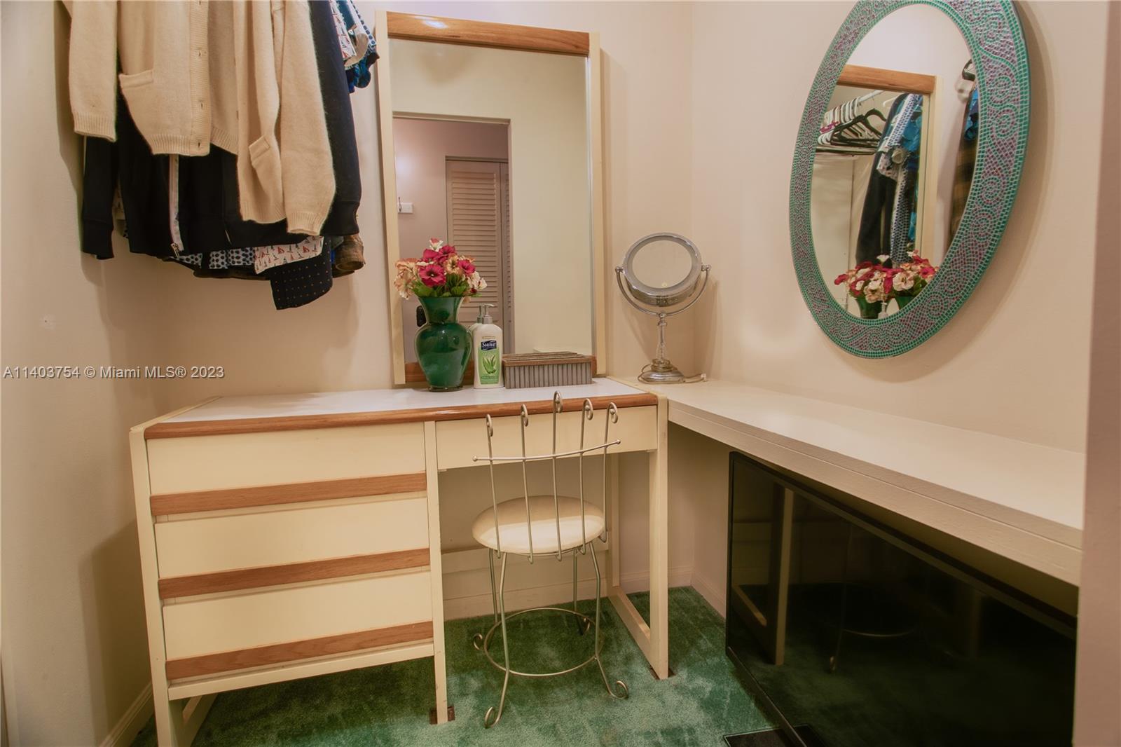894 Southwest 9th St Circle, Unit 8 Boca Raton, FL 33486 - Photo 18 of 24 a bathroom with a sink and a mirror