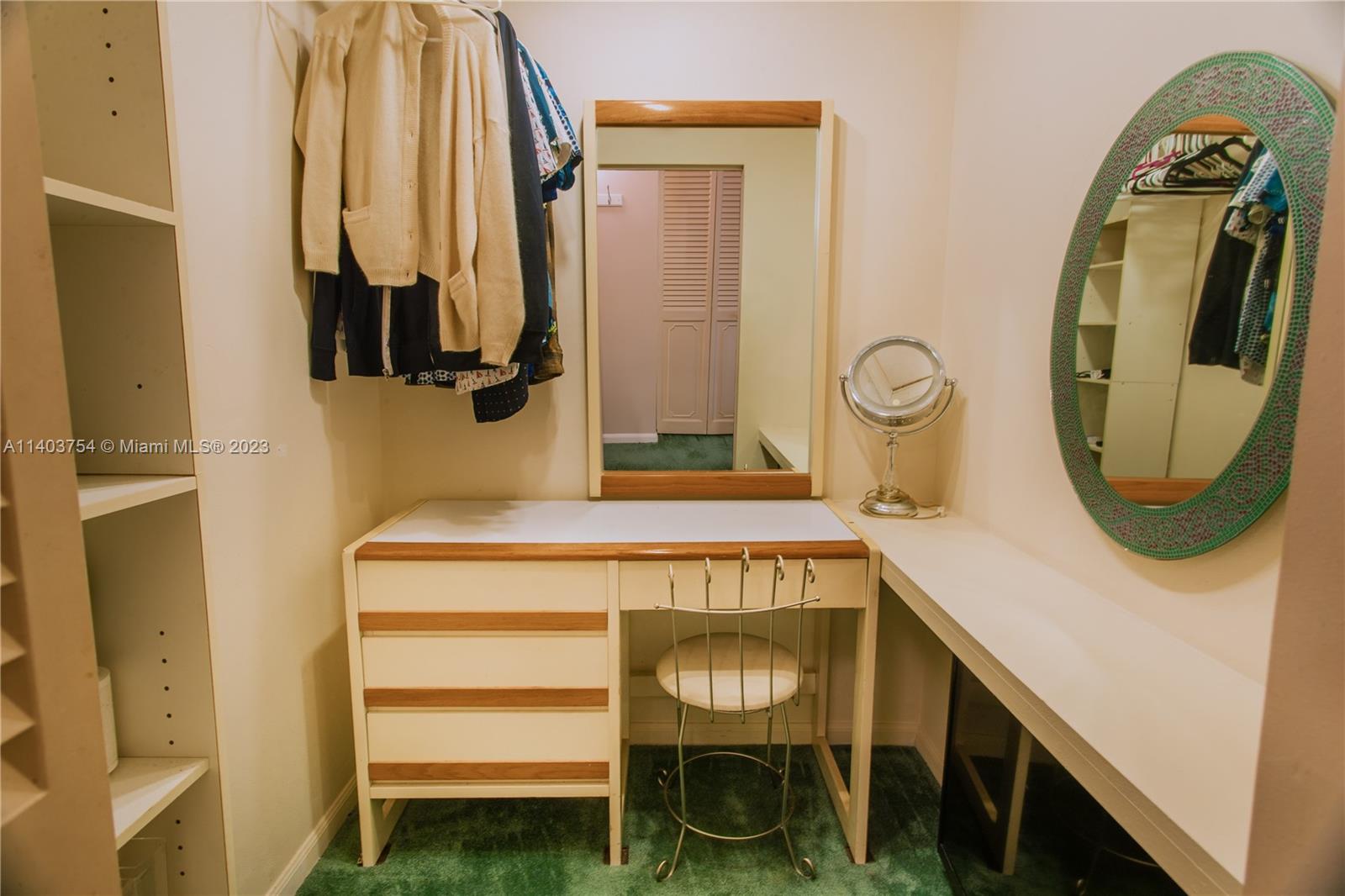 894 Southwest 9th St Circle, Unit 8 Boca Raton, FL 33486 - Photo 19 of 24 a bathroom with a sink a mirror and a bathtub