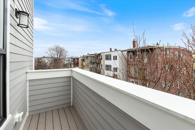 a view of a balcony with city view