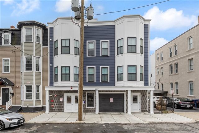 a front view of a building with street view