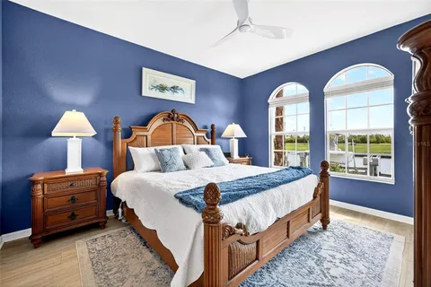 a bed room with a bed and a window