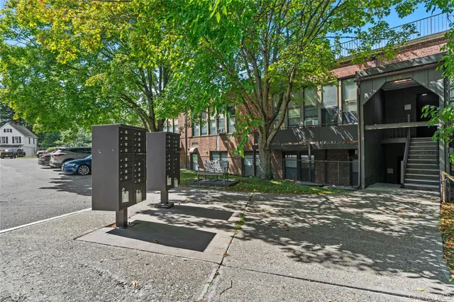 a view of a street with houses on the street