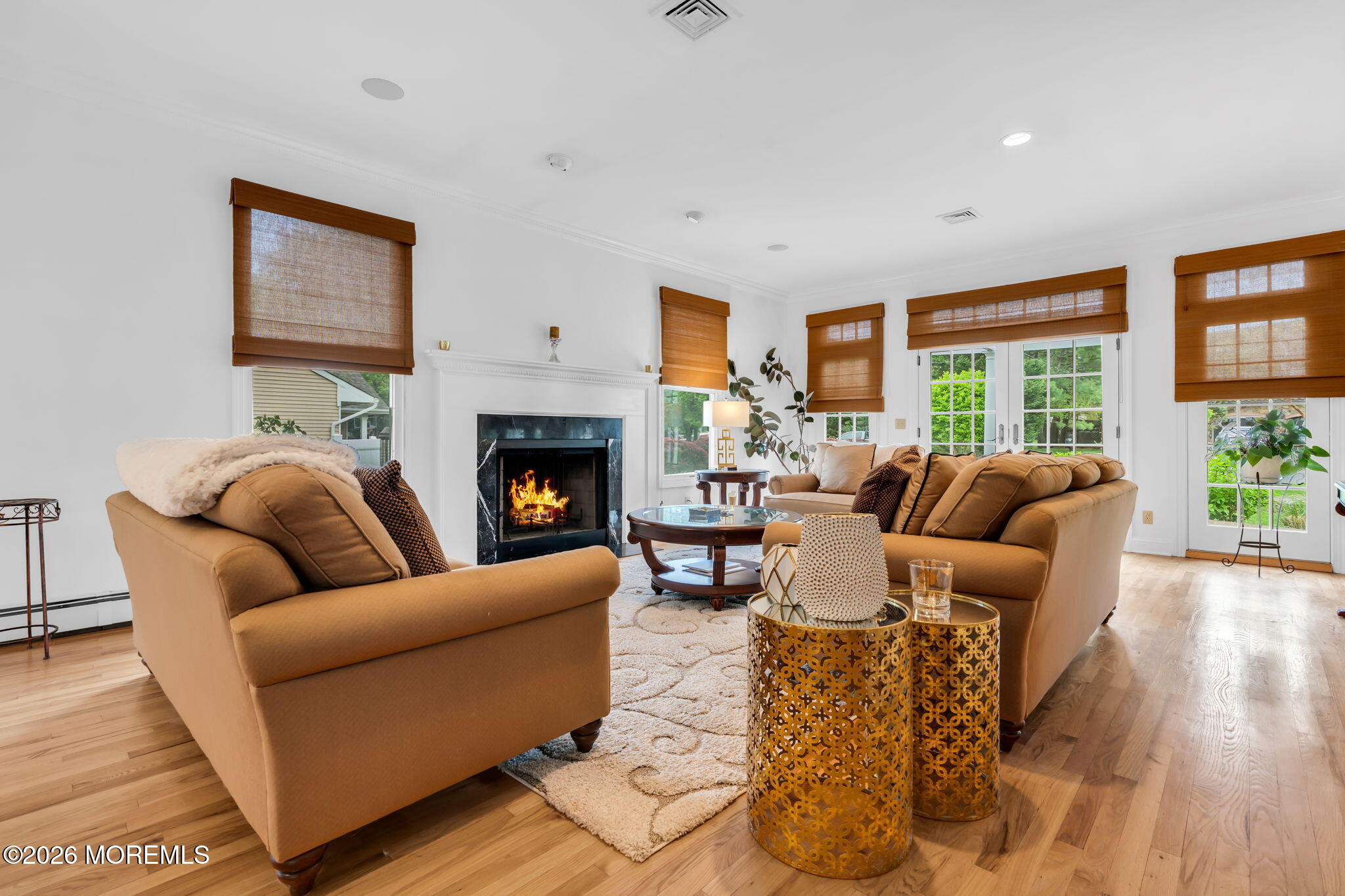 657 Valley Road Brielle, NJ 08730 - Photo 12 of 44 a living room with furniture fireplace and a large window