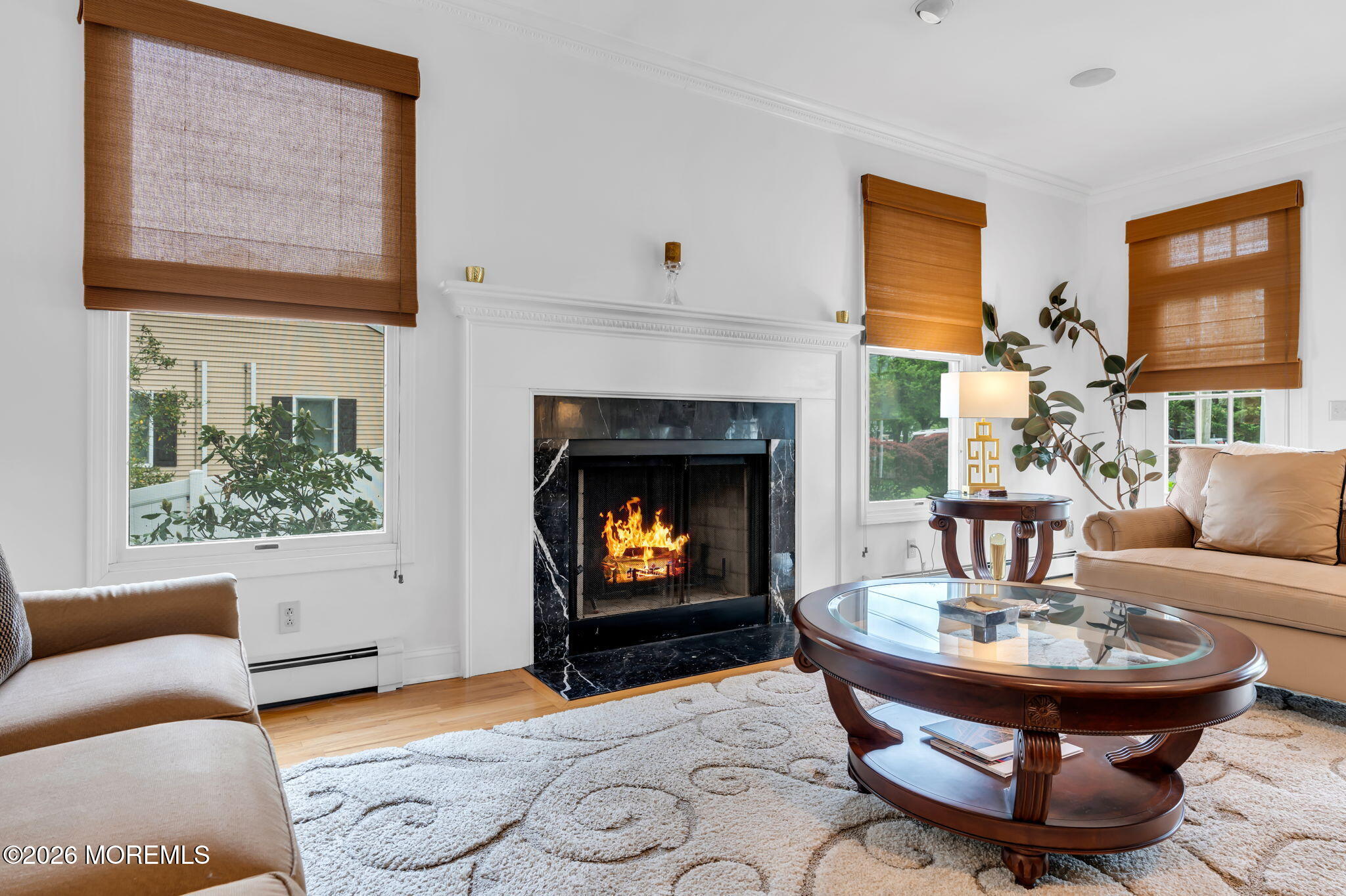 657 Valley Road Brielle, NJ 08730 - Photo 13 of 44 a living room with furniture and a fireplace