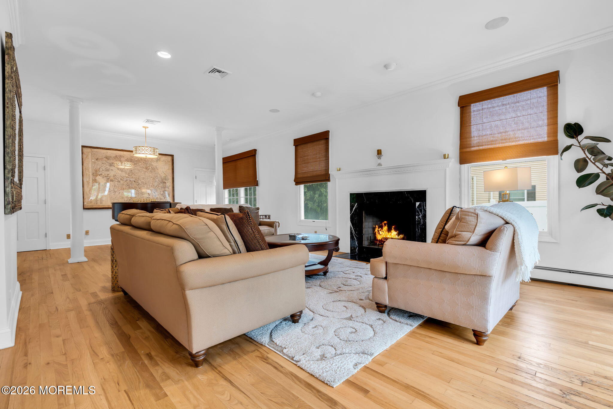 657 Valley Road Brielle, NJ 08730 - Photo 14 of 44 a living room with furniture and a fireplace
