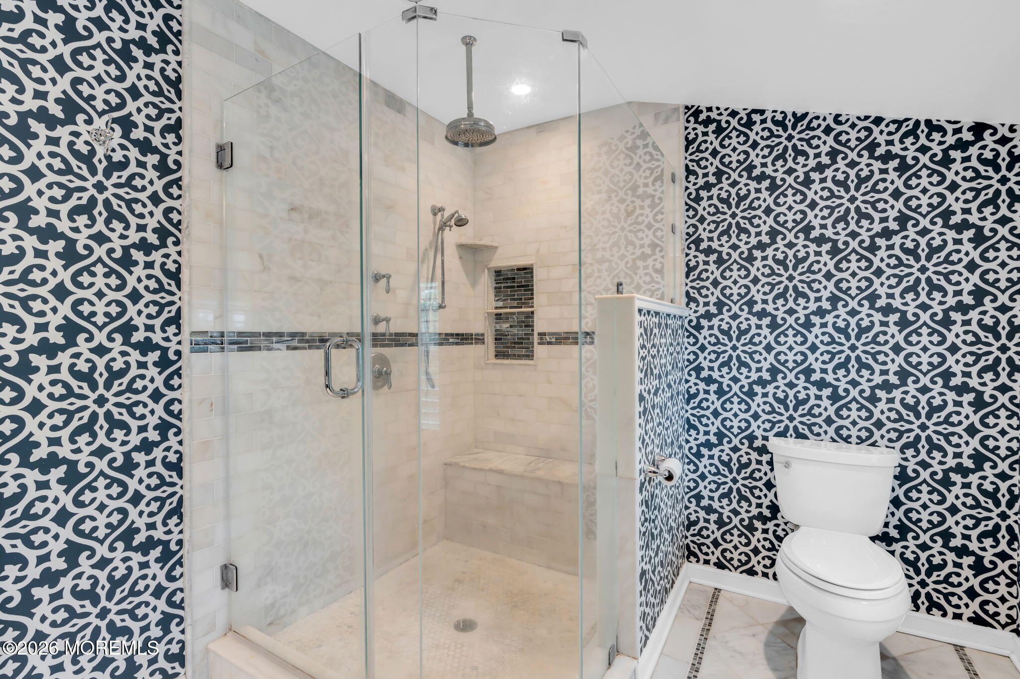 657 Valley Road Brielle, NJ 08730 - Photo 25 of 44 a bathroom with a shower toilet and a sink