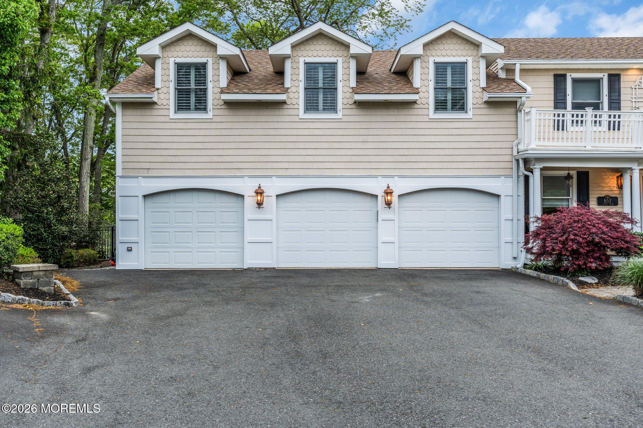 657 Valley Road Brielle, NJ 08730 - Photo 3 of 44 a front view of a house with a garage