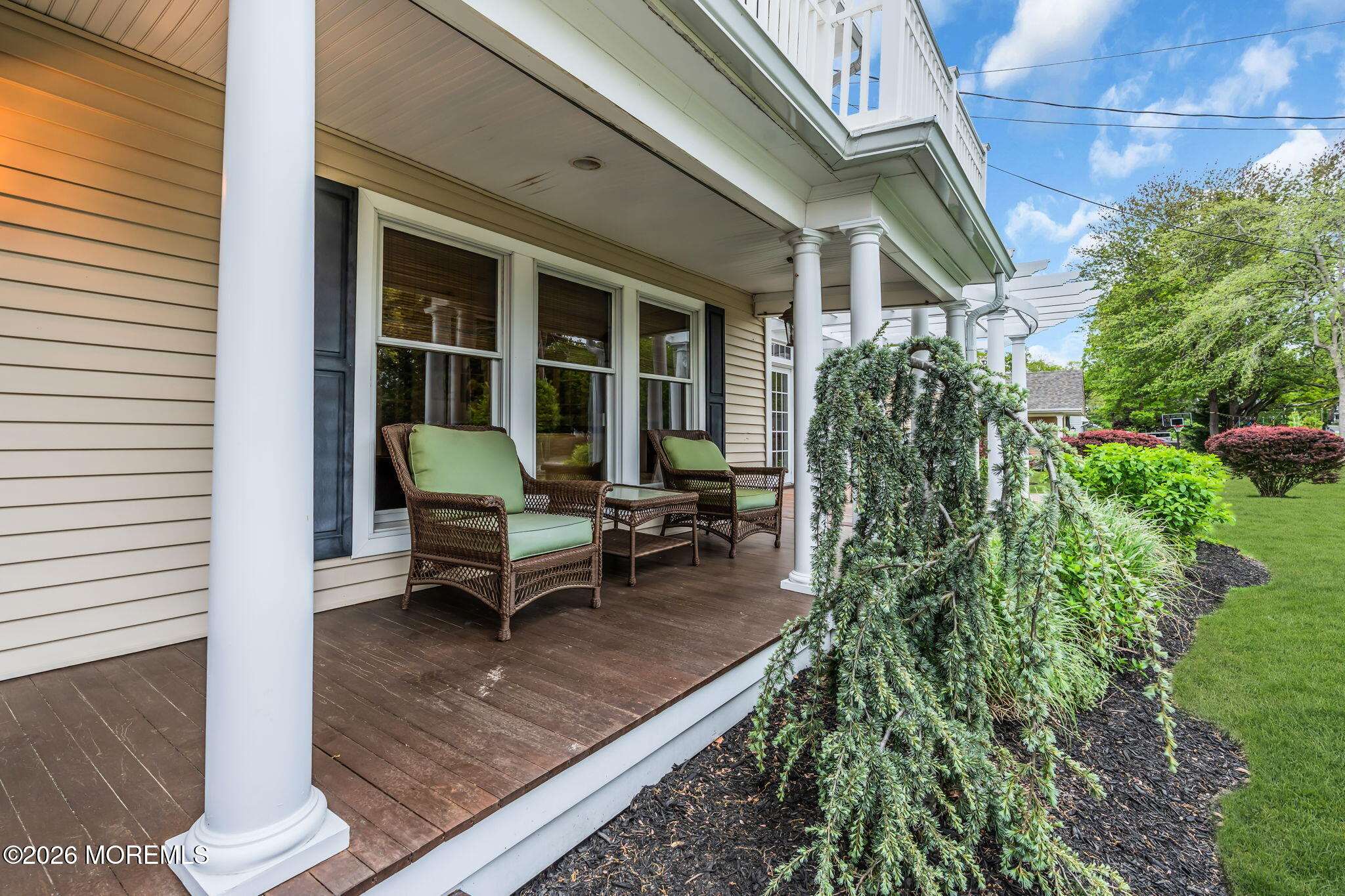 657 Valley Road Brielle, NJ 08730 - Photo 4 of 44 a view of a house with sitting area and garden