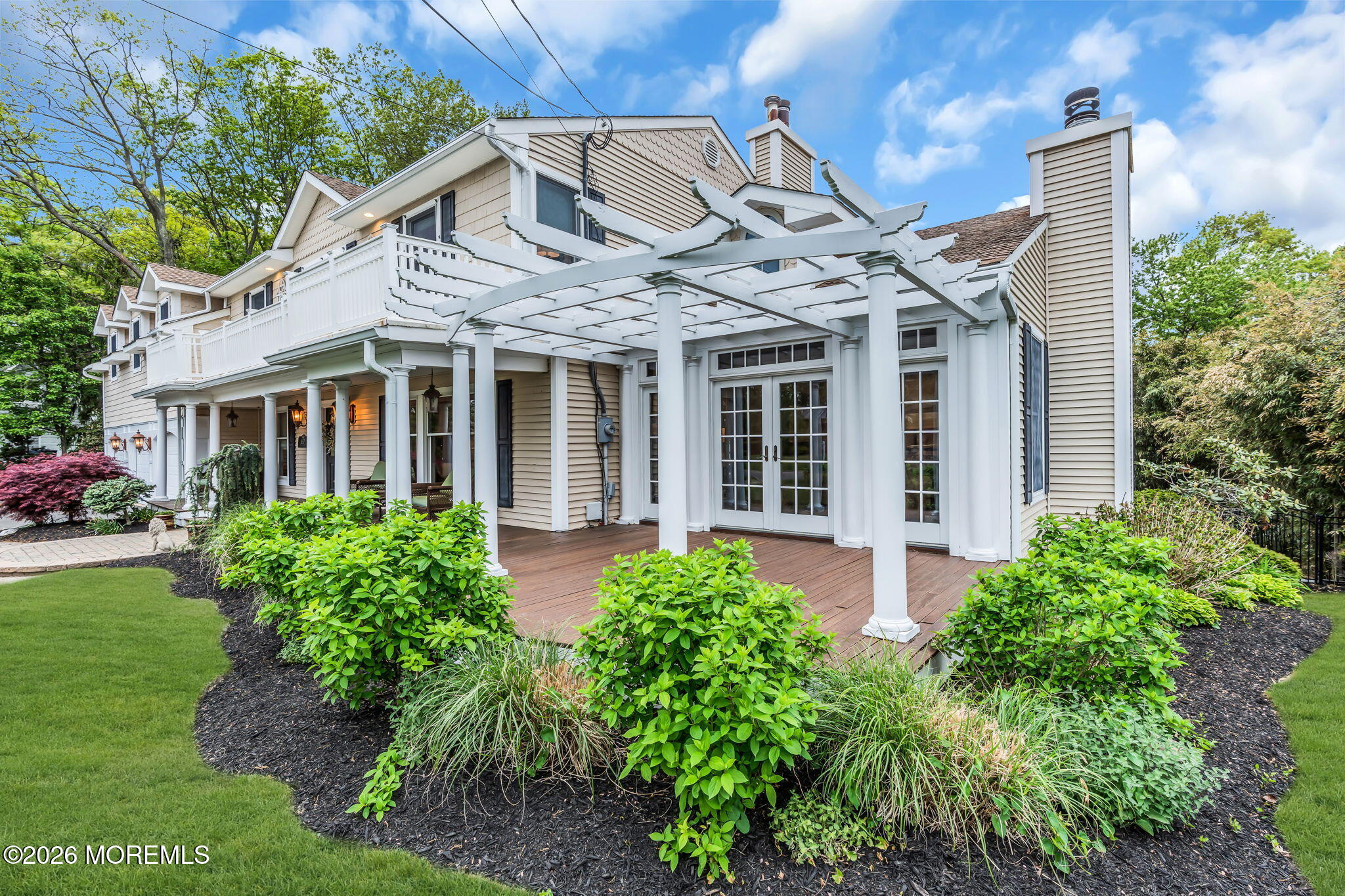 657 Valley Road Brielle, NJ 08730 - Photo 6 of 44 a front view of a house with garden