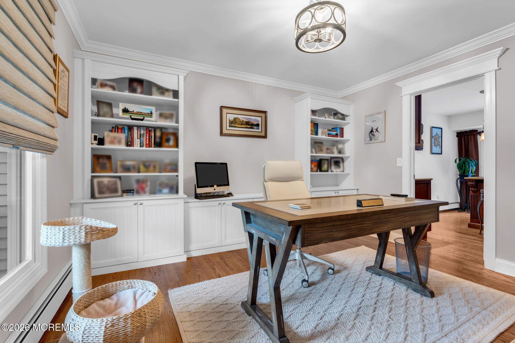 657 Valley Road Brielle, NJ 08730 - Photo 7 of 44 a view of a workspace with furniture and wooden floor