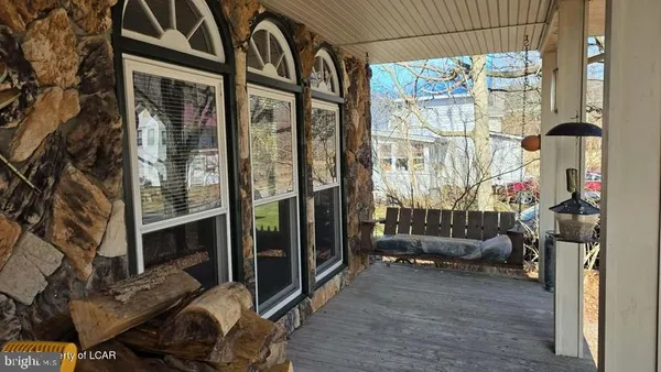 a front view of a house with a porch