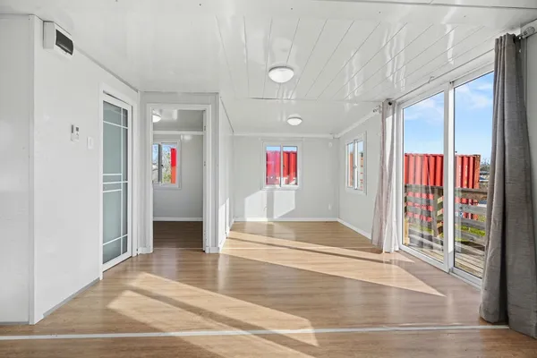 a view of an empty room and window