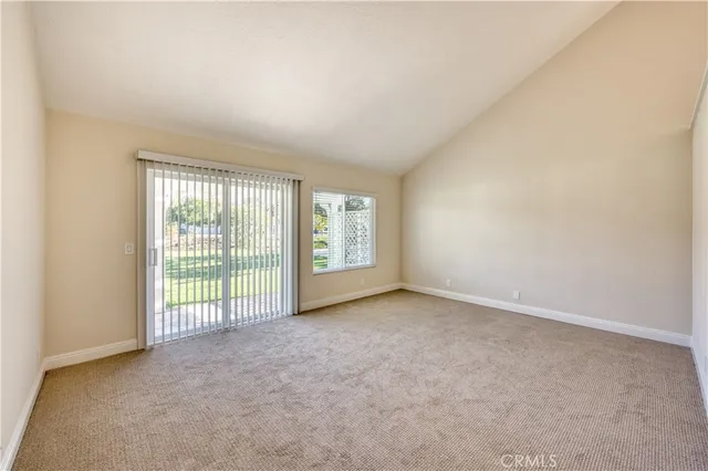 a spacious bathroom with a double vanity sink and a mirror