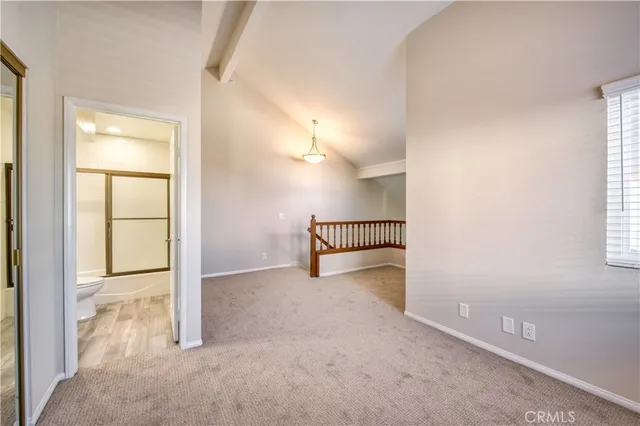 a front view of a house with a garden and porch