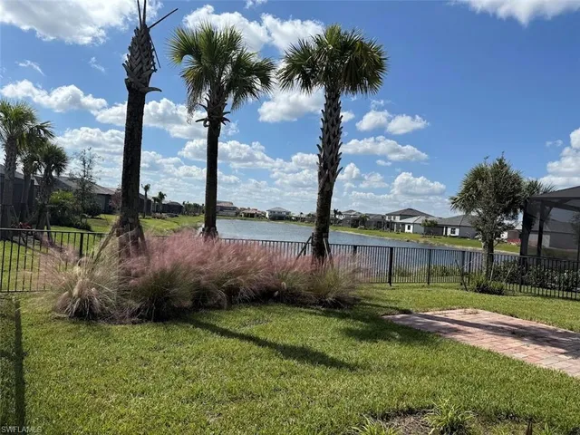 a kitchen with kitchen island a counter appliances and cabinets