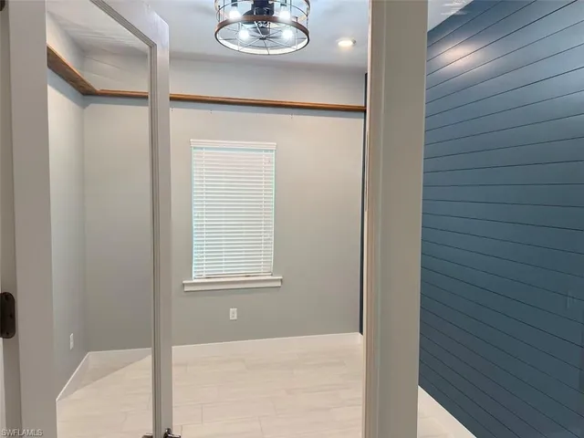 a view of a house with a iron gate