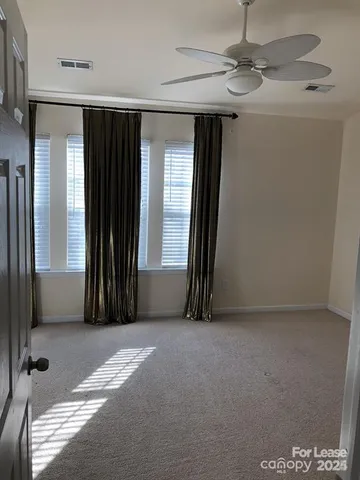 a view of a livingroom with a staircase