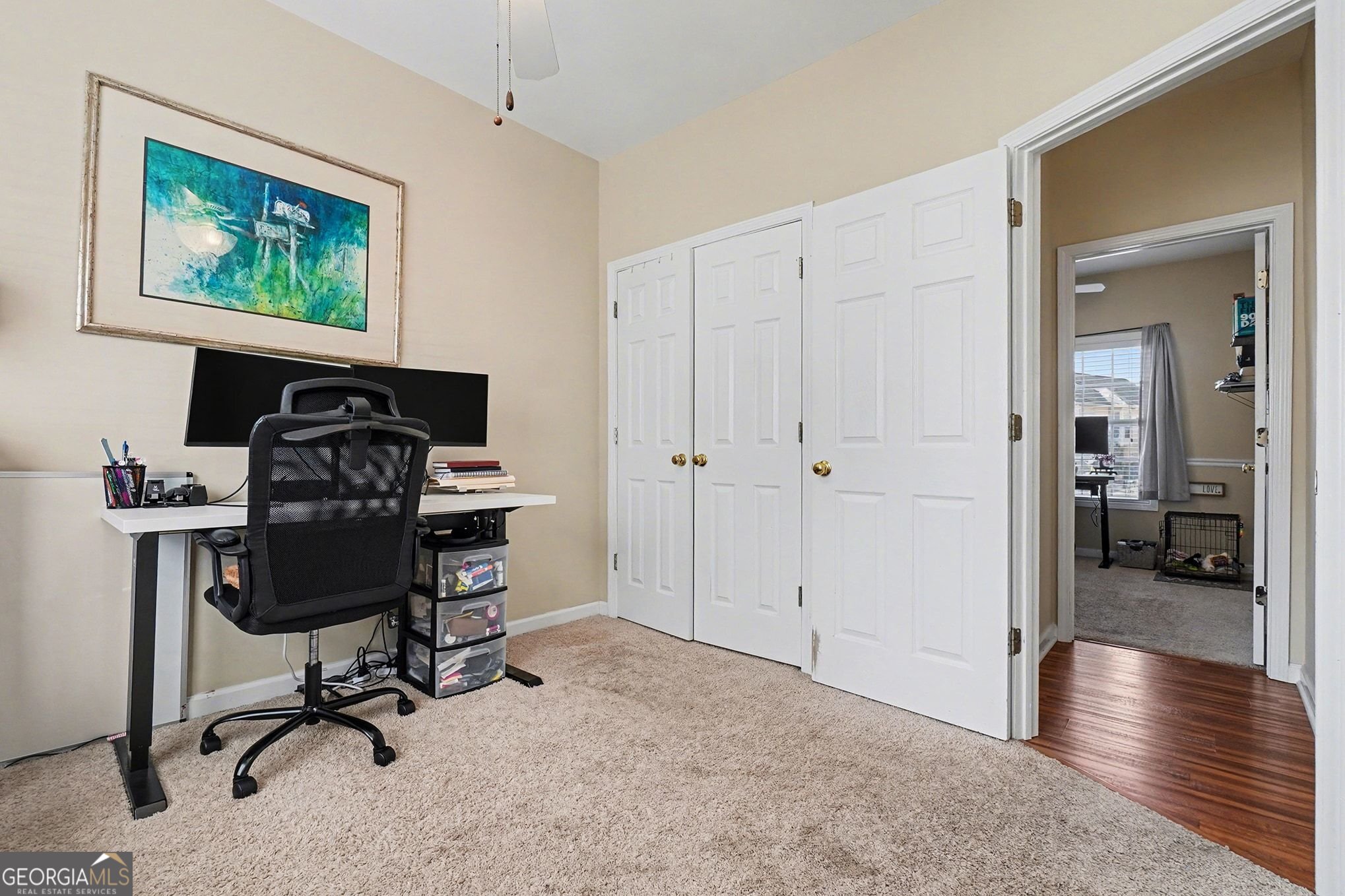 310 Turtle Pointe Drive Carrollton, GA 30116 - Photo 14 of 32 a view of a workspace with furniture and gym equipment