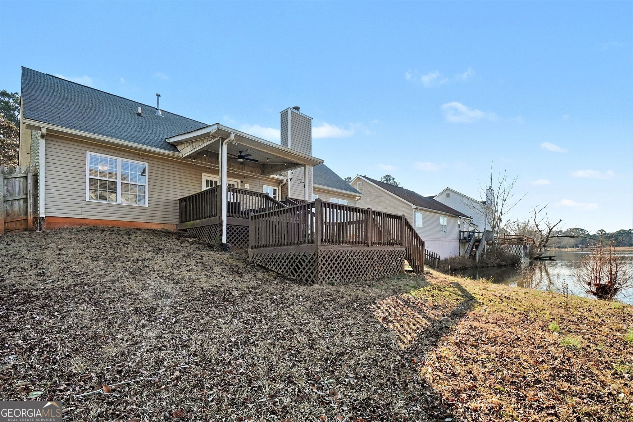 310 Turtle Pointe Drive Carrollton, GA 30116 - Photo 27 of 32 a view of a house with a yard
