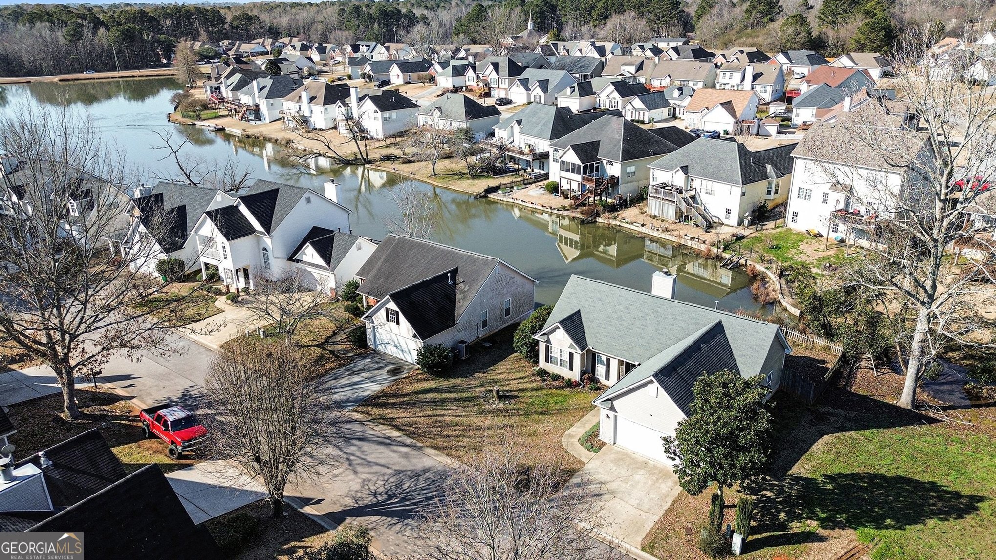 310 Turtle Pointe Drive Carrollton, GA 30116 - Photo 32 of 32 an aerial view of a house with a yard