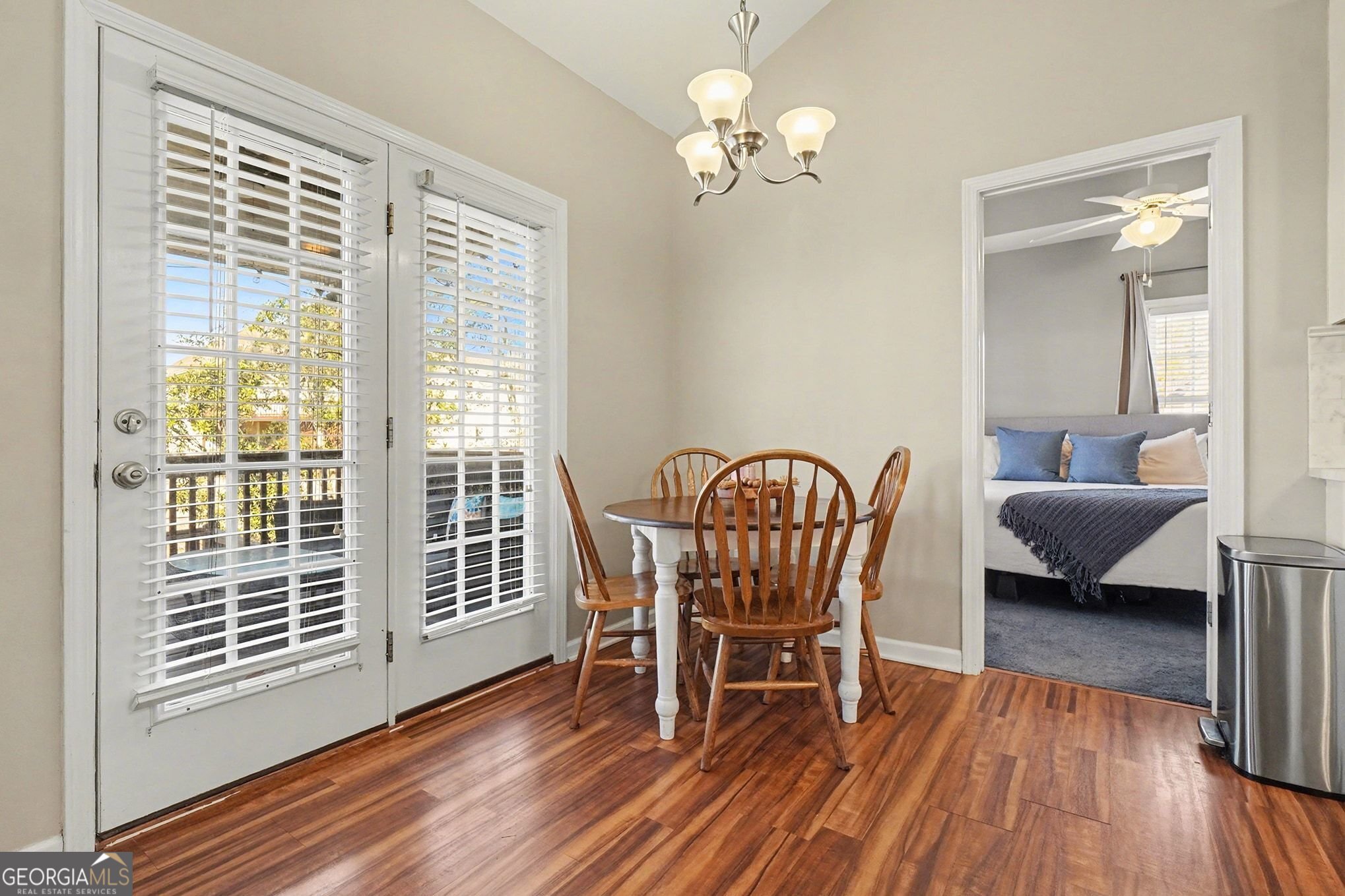 310 Turtle Pointe Drive Carrollton, GA 30116 - Photo 8 of 32 a view of a livingroom with furniture wooden floor and windows