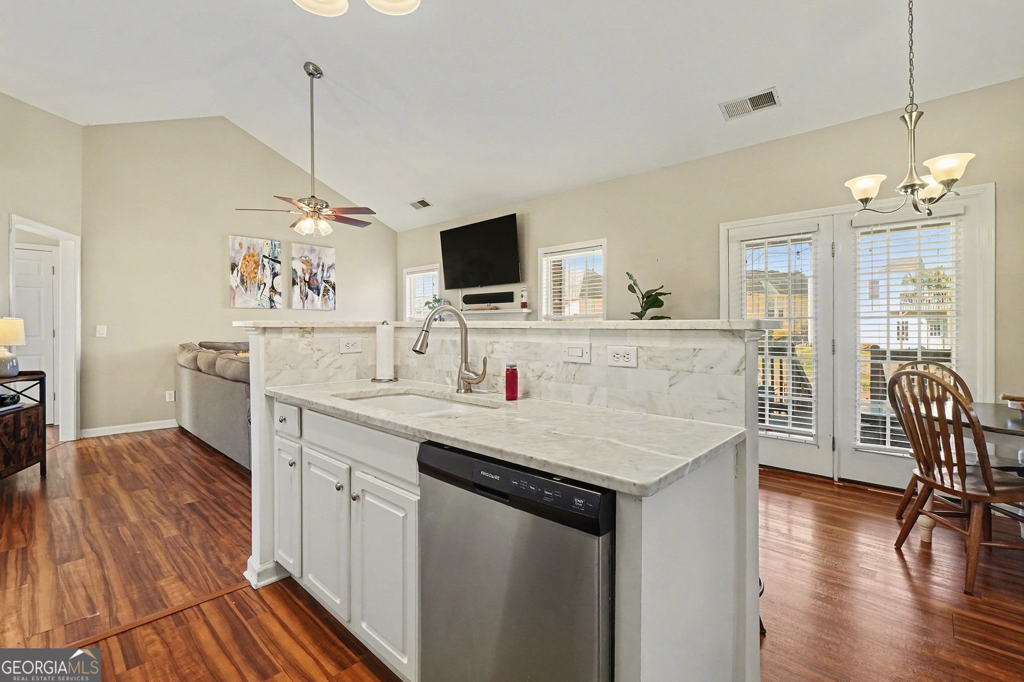 310 Turtle Pointe Drive Carrollton, GA 30116 - Photo 9 of 32 a view of living room with granite countertop furniture and fireplace