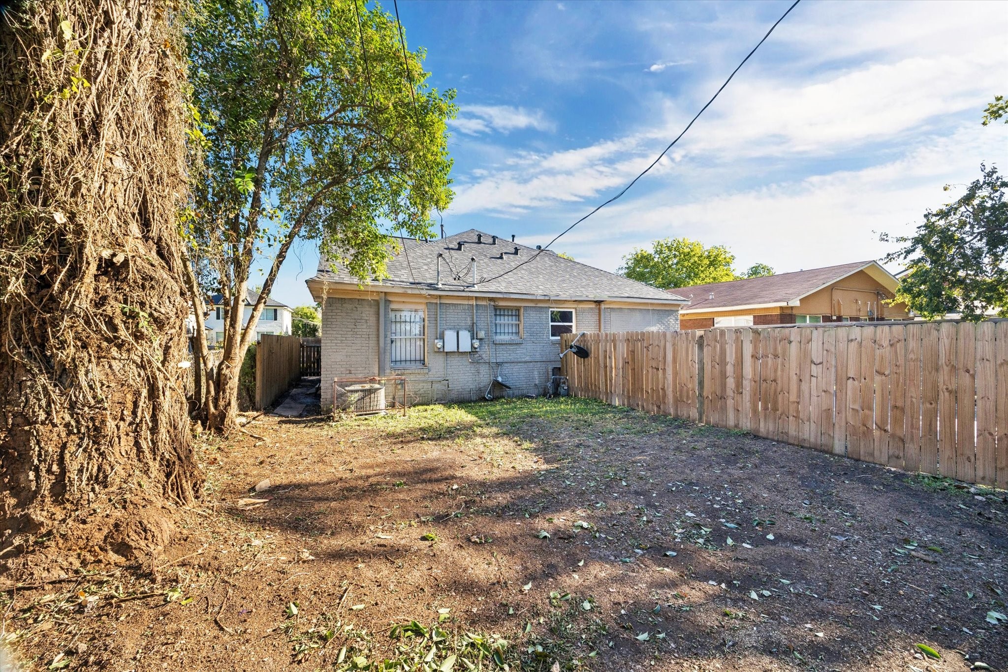2612 Isabella Street Houston, TX 77004 - Photo 25 of 34 a view of a house with a yard