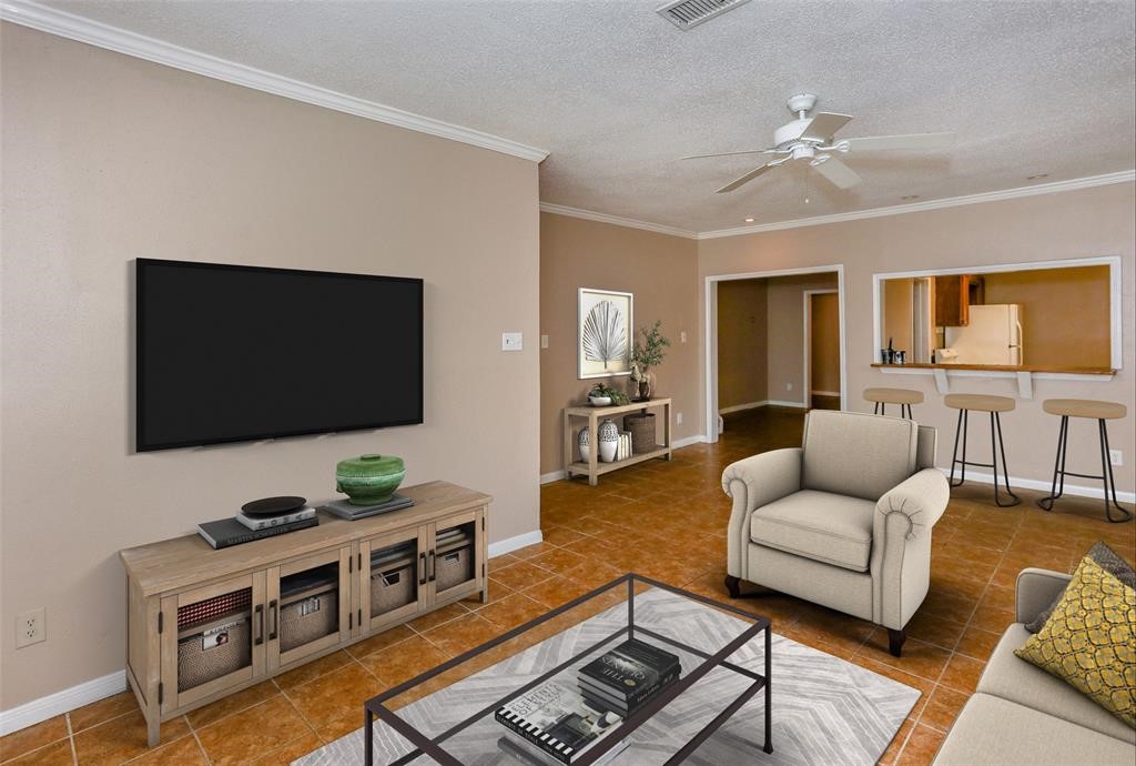 2612 Isabella Street Houston, TX 77004 - Photo 4 of 34 a living room with furniture and a flat screen tv
