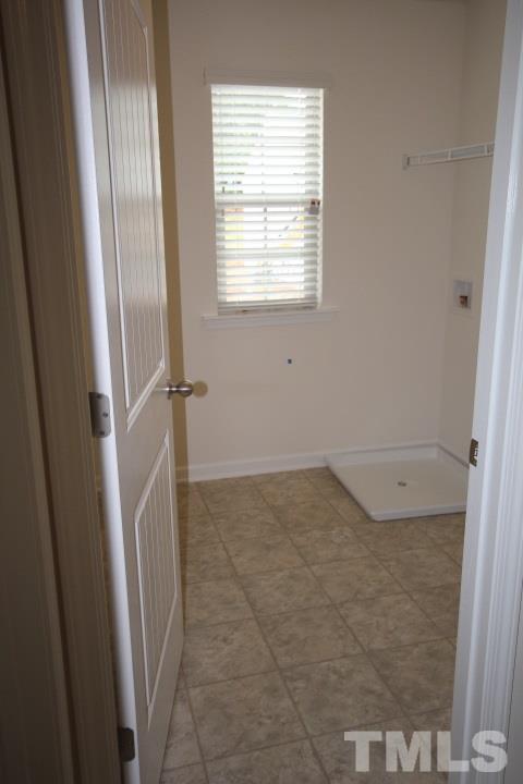 2705 Communion Court Raleigh, NC 27610 - Photo 20 of 24 a view of a bathroom with a sink