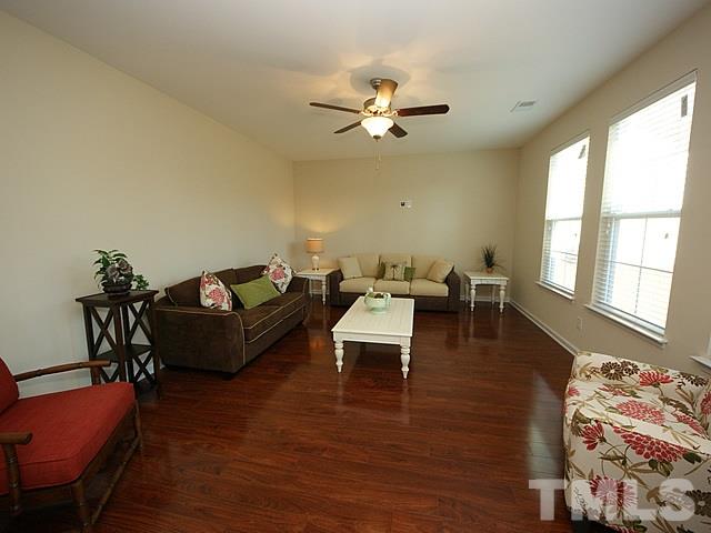 2705 Communion Court Raleigh, NC 27610 - Photo 9 of 24 a living room with furniture and a window