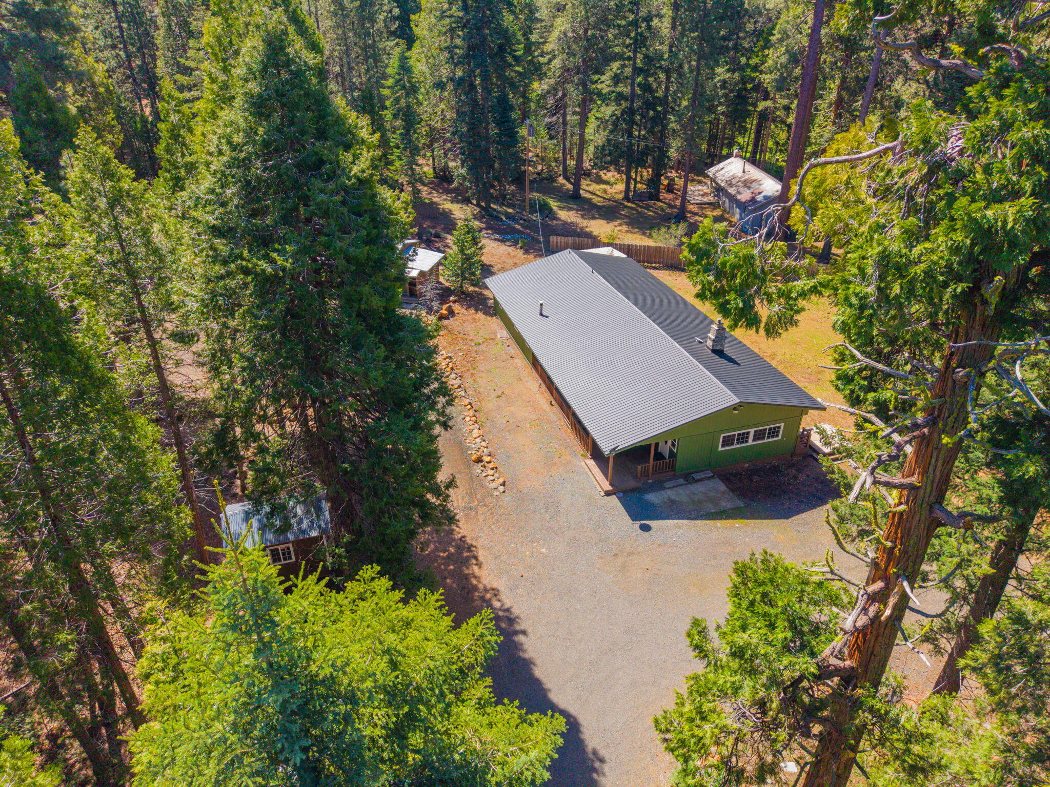 7682 Brokeoff Meadows Road Shingletown, CA 96088 - Photo 50 of 64 Aerial of new roof