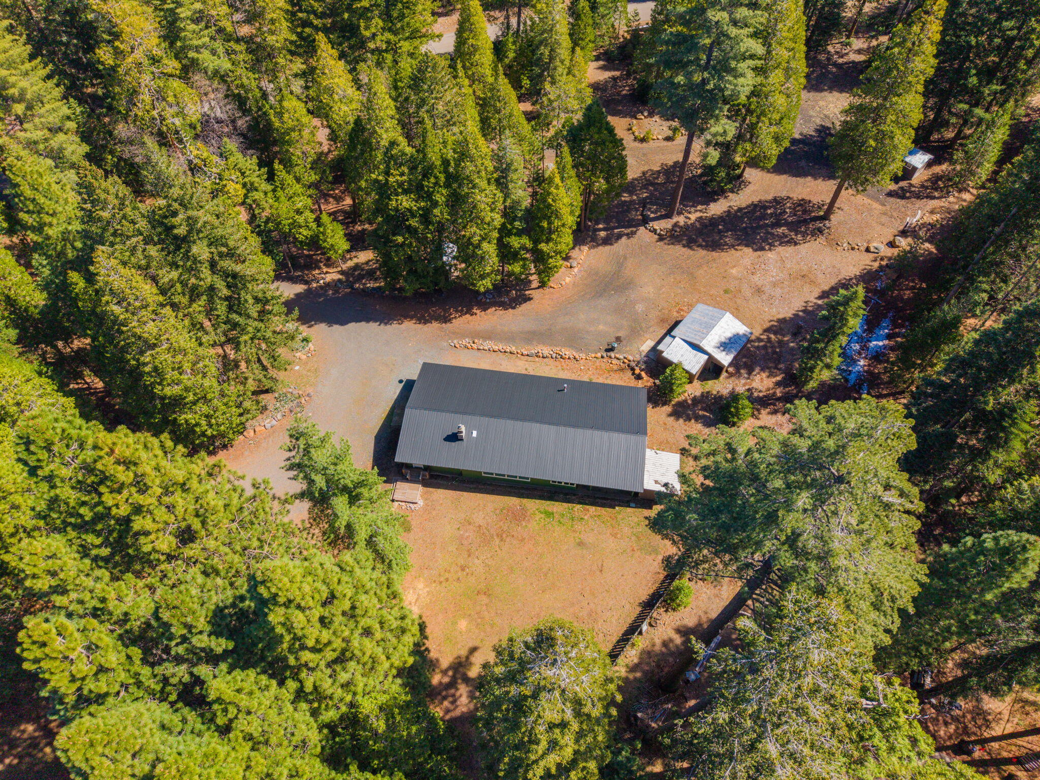 7682 Brokeoff Meadows Road Shingletown, CA 96088 - Photo 52 of 64 Aerial of new roof