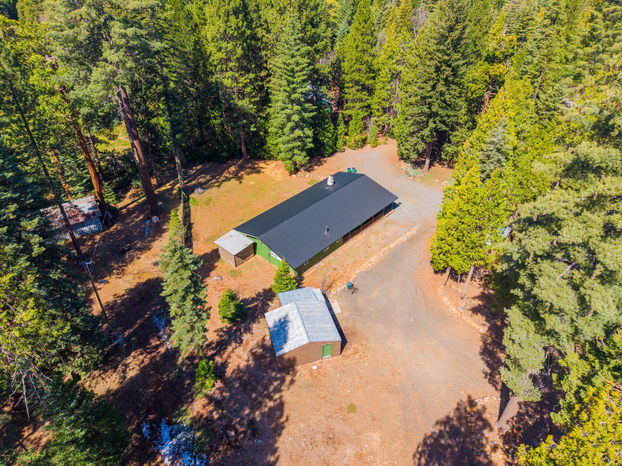 7682 Brokeoff Meadows Road Shingletown, CA 96088 - Photo 53 of 64 Aerial of new roof