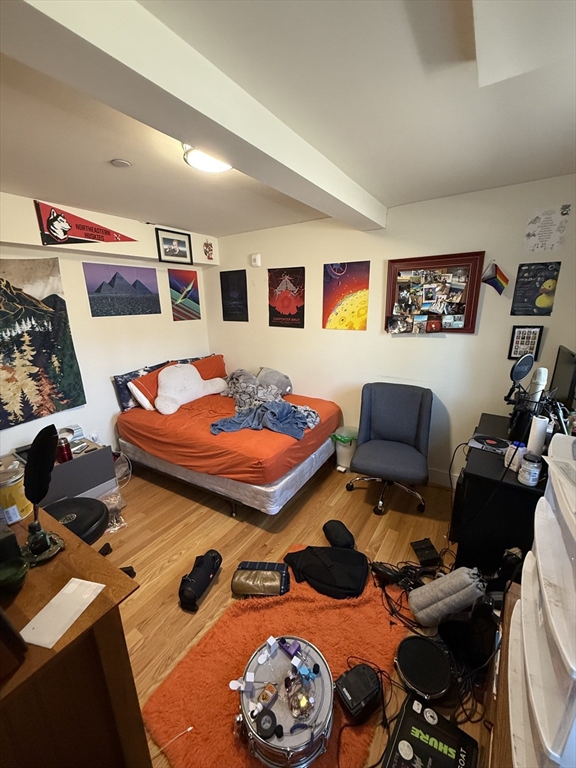 65 Cameron Street, Unit 3 Brookline, MA 02445 - Photo 12 of 16 a living room with furniture and a rug