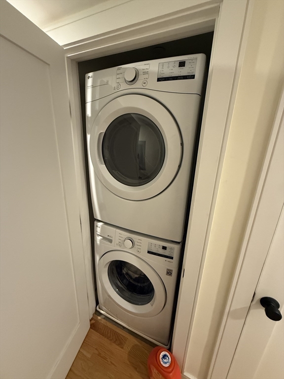 65 Cameron Street, Unit 3 Brookline, MA 02445 - Photo 15 of 16 a utility room with dryer and washer