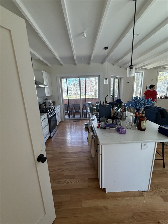 65 Cameron Street, Unit 3 Brookline, MA 02445 - Photo 5 of 16 a view of a dining room with furniture window and wooden floor