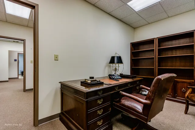a view of workspace with wooden floor