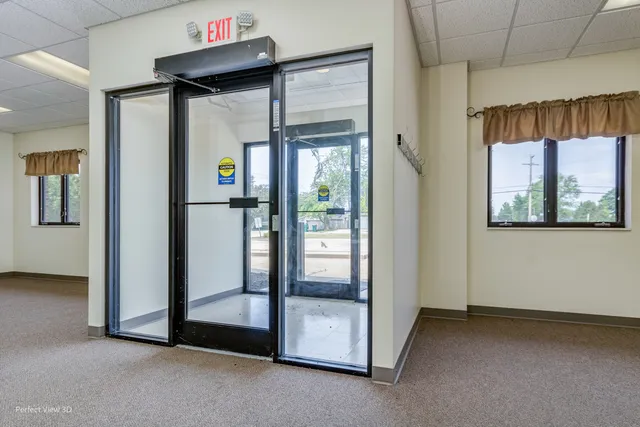 a view of empty room with windows